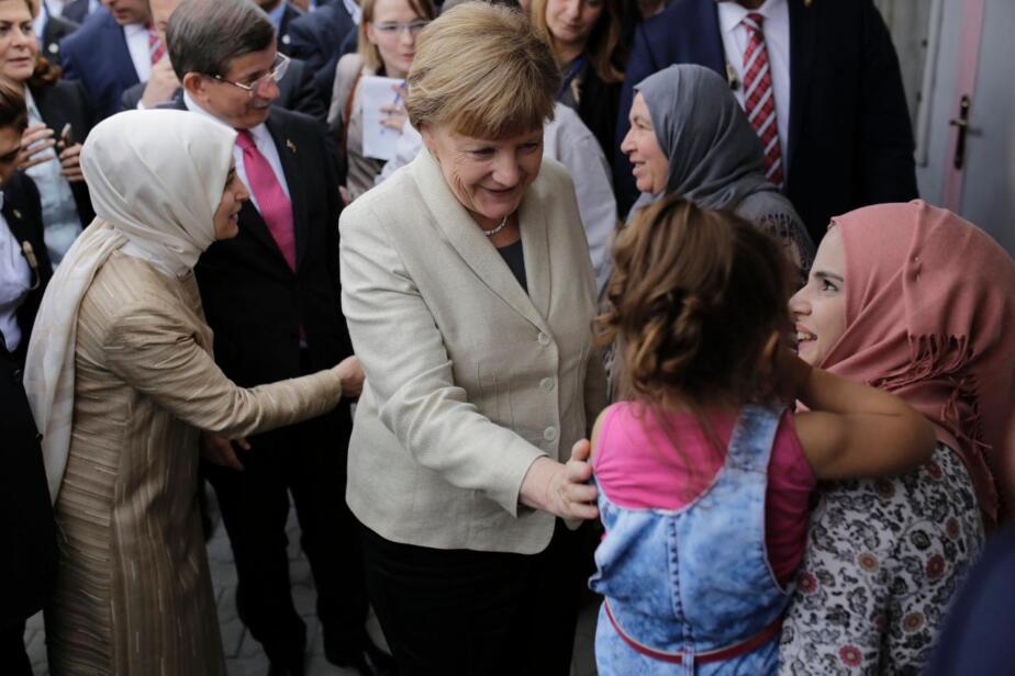 Merkel ja immigrandid